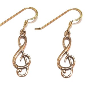 Øredobber med G-nøkkel motiv