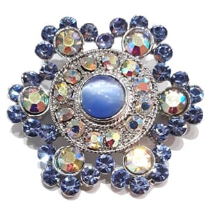 Brosje med blomstermotiv