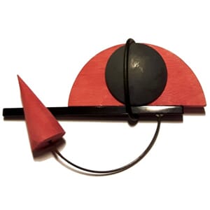 Brosje i plexiglass og tre