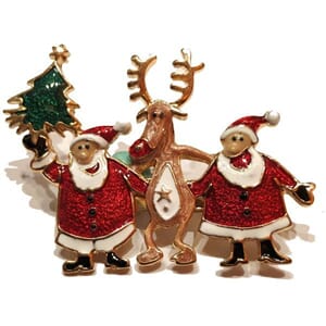 Brosje med nisse og reinsdyr motiv