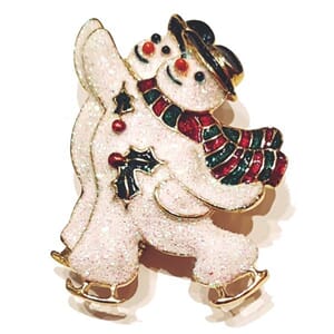 Brosje med snømann-motiv