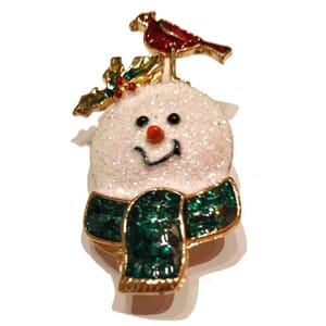 Brosje med snømann-motiv