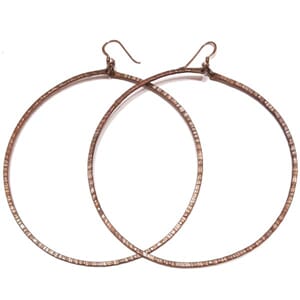 Store øreringer i kobber